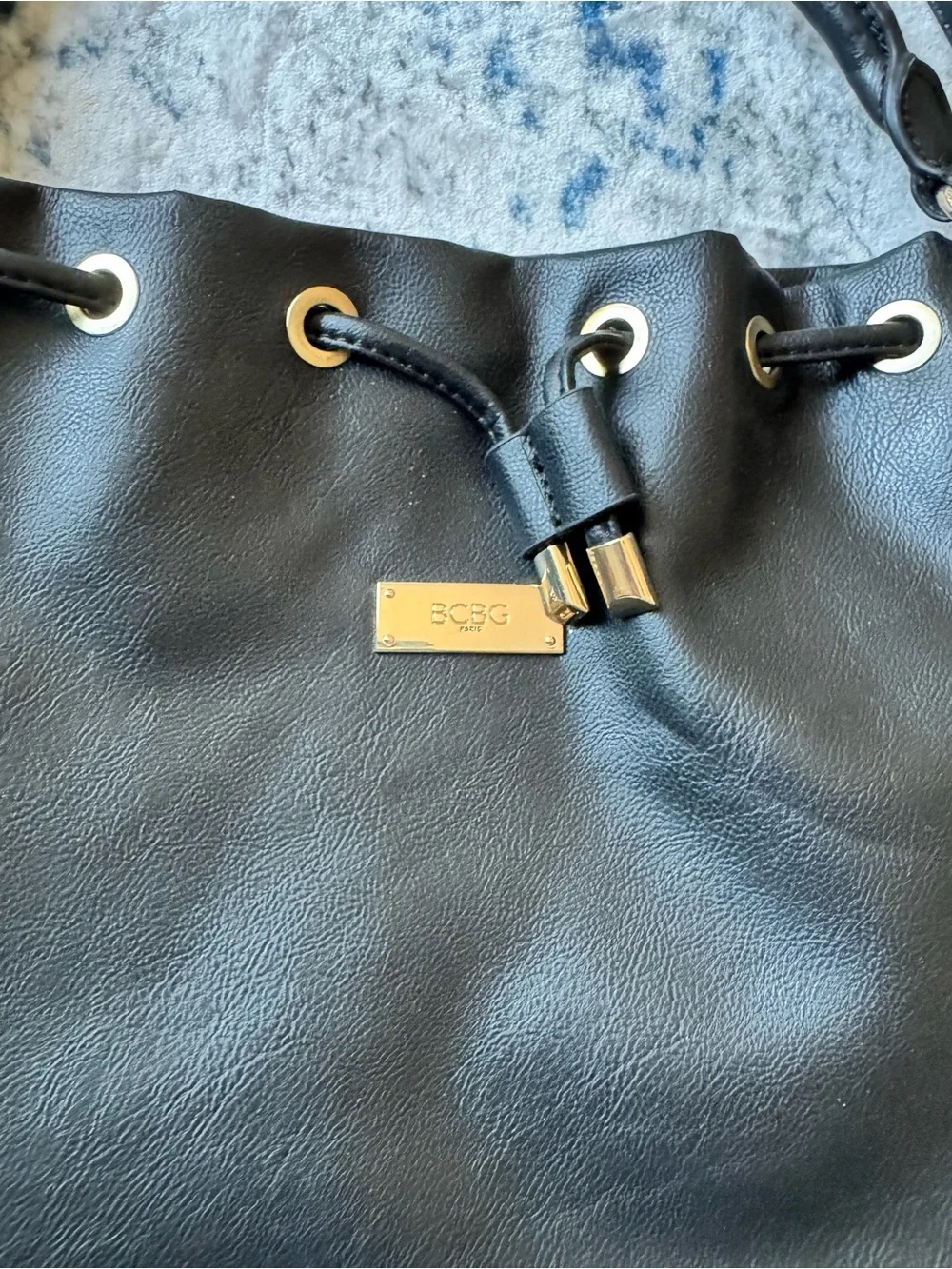 BCBG Paris - Black Tassel Accent Bucket Purse With Shoulder Strap
